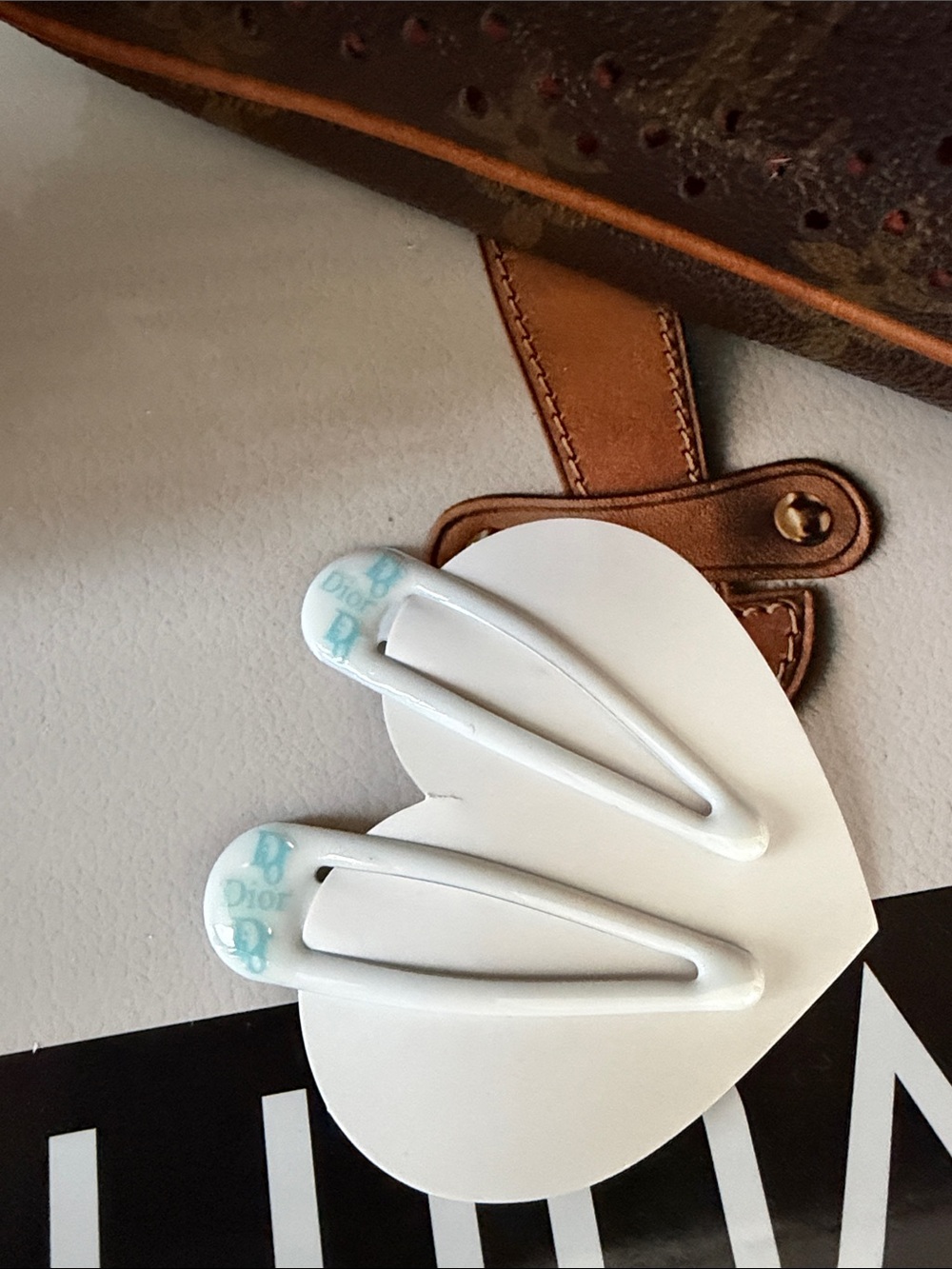 White Dior Hair Clips with Light Blue Logo Accent